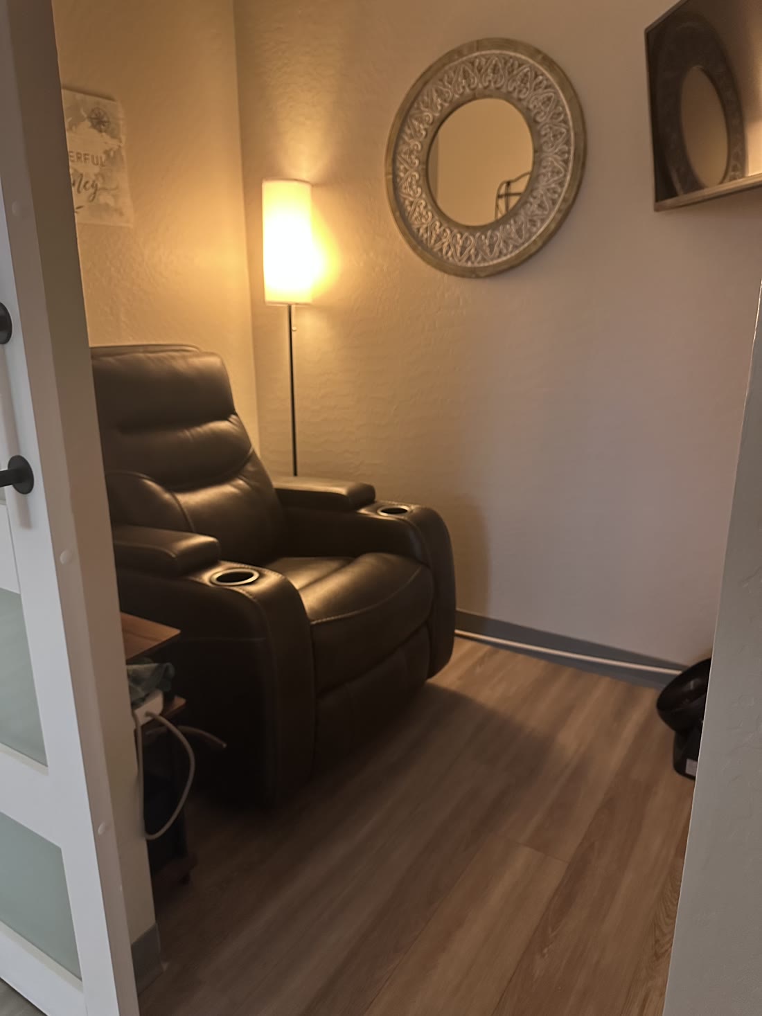 A private Spravato recliner suite at ReNew Wellness with soft lighting and comfortable seating
